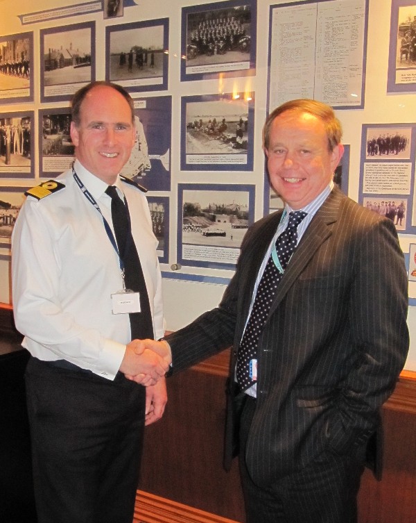 Russell Searle (r), chapter president, thanks Cdre. Richard Stokes, RN, programme director for defence reform implementation, for his presentation in May.
